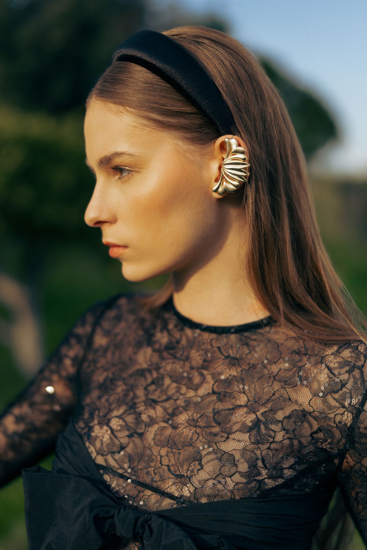 LONG BLACK DRESS WITH DRAMATIC BOWS